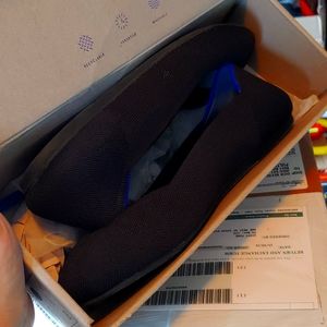 Black Rothy flats
